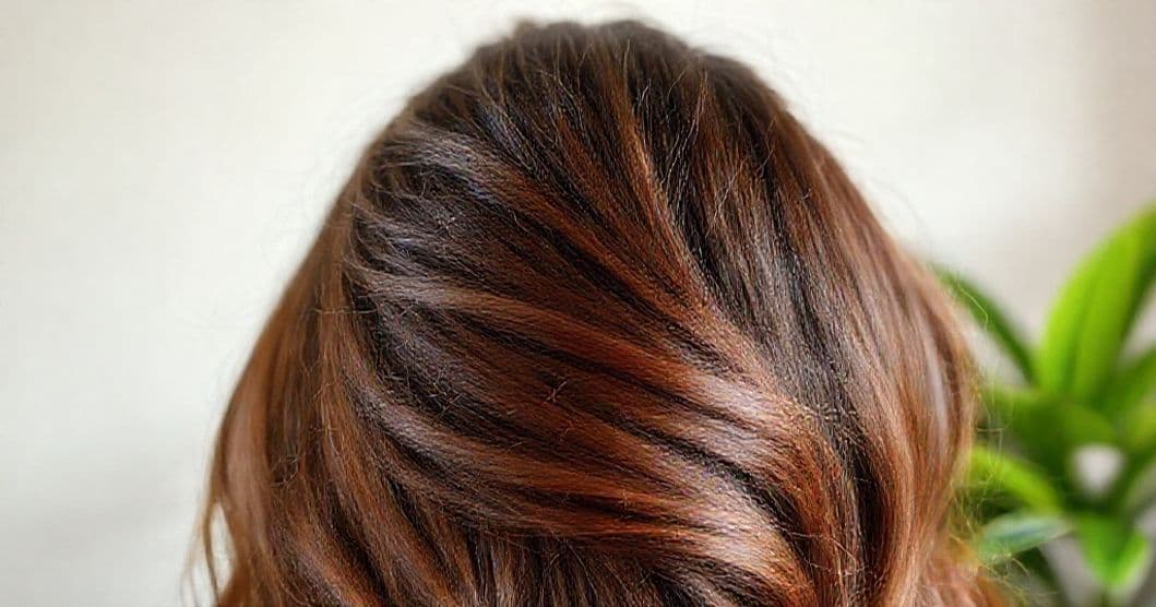A hopeful, calm image of hair regrowth and a comforting message of support