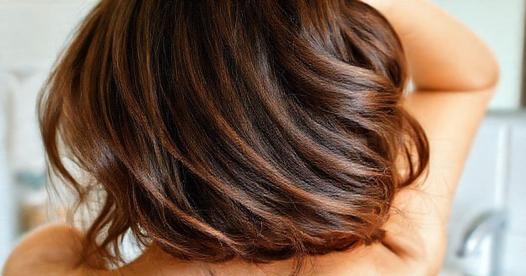 Hopeful person with healthier hair and a calm expression